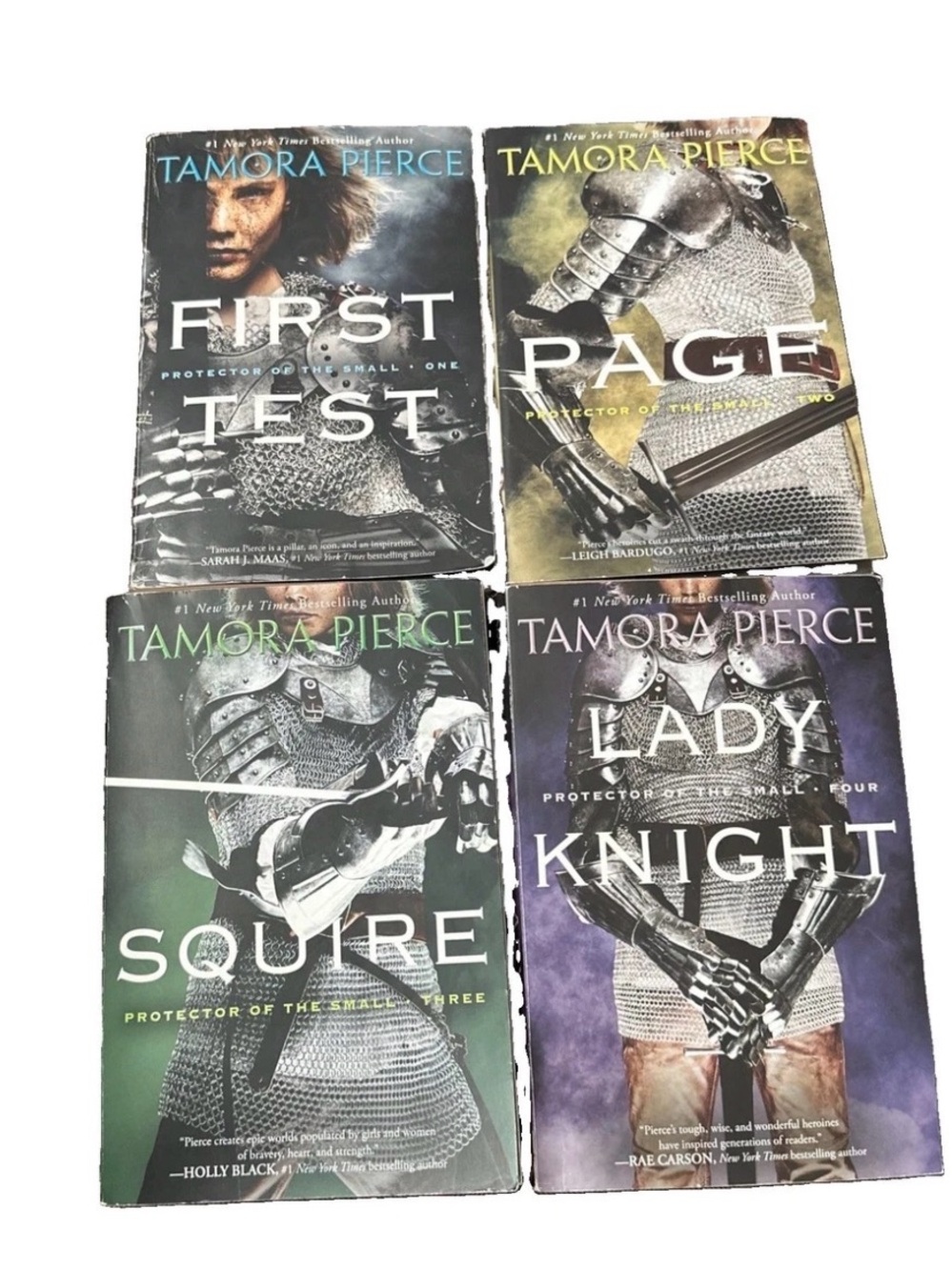 Source Unknown Tamora Pierce Book Set - Green, Purple, Black, Yellow Covers